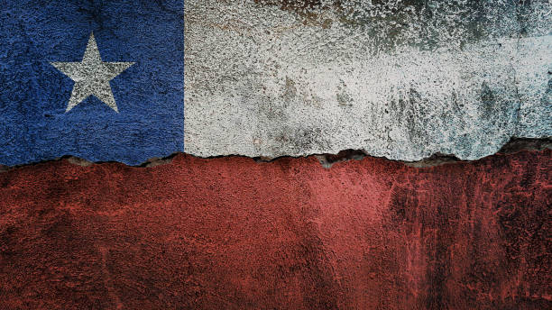 istock Chile flag on cracked wall. Earthquake or drought concept 1467100270
