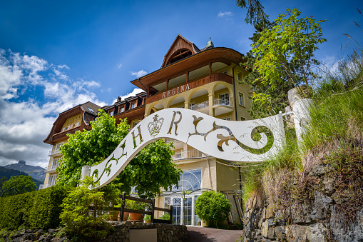 Lauterbrunnen, Switzerland - May 24, 2020: Old historic hotel in small village of Wengen in Switzerland during sunny day in May 2020