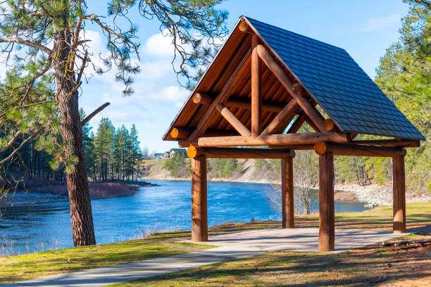 istock A log gazebo sits in Corbin Park overlooking the Spokane River on a summer day in Post Falls, Idaho, USA. Post Falls is the neighboring city and considered part of the general Coeur d'Alene area of the North Idaho Panhandle. 1467102600