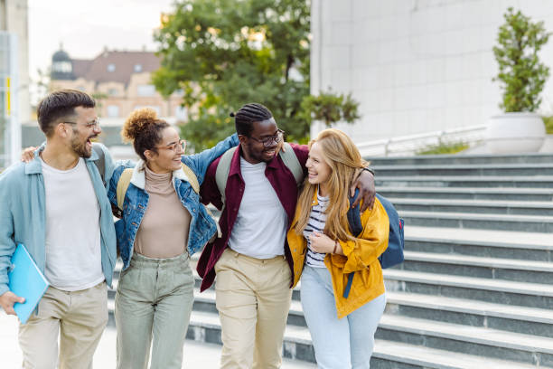 istock Happy Multi-ethnic group of students on the street 1467113513