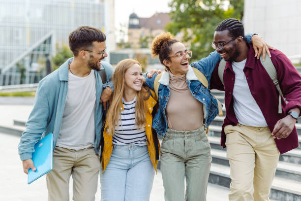 istock Happy Multi-ethnic group of students on the street 1467113688