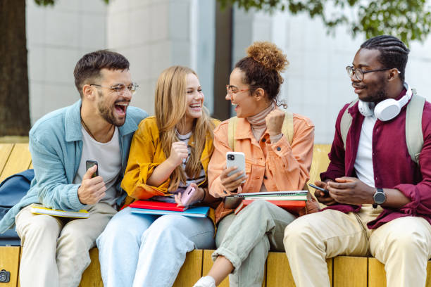 istock Cheerful students received a good news 1467114056