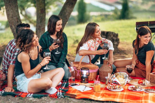 istock happiness friends doing a summer picnic together 1467122137