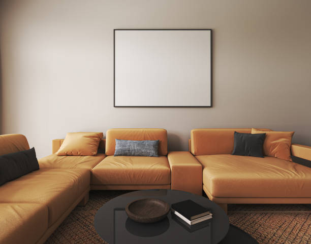 istock Beige interior design with light orange sofa, black table and decor in modern minimal living room. Frame wall mock up. 3d render. High quality 3d illustration 1467126726