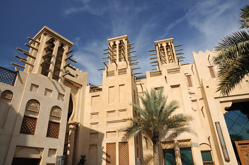 Buildings with Traditional Arabic Wind Towers in Dubai, United Arab Emirates