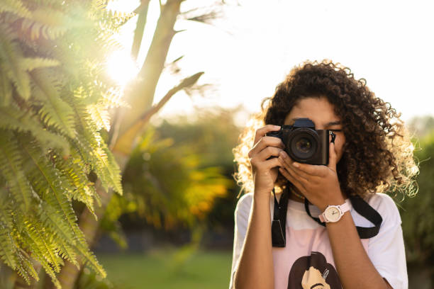 istock Photographer taking photo in nature 1467127433