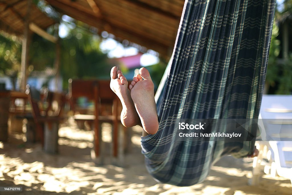 on vacation girl on vacation relax in hammock Beach Stock Photo