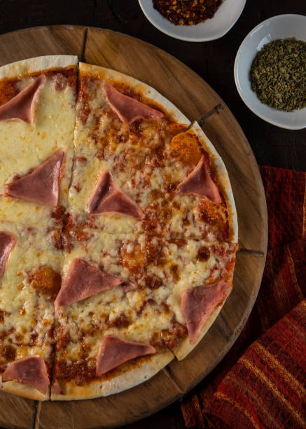 istock Delicious handmade pizza with cheese and different ingredients. homemade dough. rustic style, pepperoni 1467131207