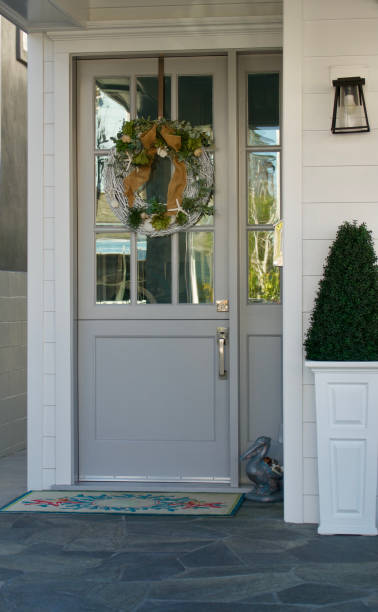 istock Modern front door with beach themed wreath 1467133296