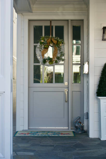 istock Modern front door with beach themed wreath 1467133302