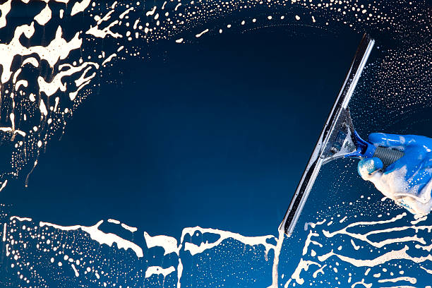 istock Window washer cleaning glass 146713431