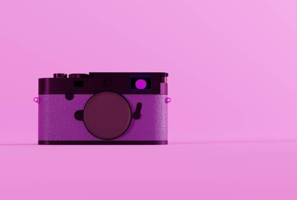 istock Retro photo camera on a pink background. 1467135827