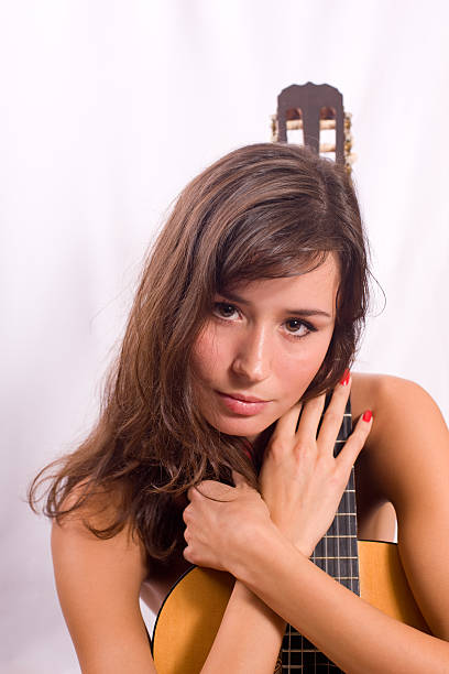 istock girl with a guitar 146713594