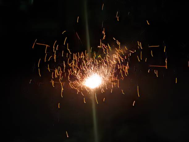 istock New Year Beautiful fireworks splash effect, yellow and red fireworks, black background isolated 1467136553