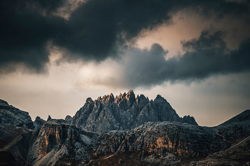 Fantastic mountain landscape other side of Dolomiten mountains view of Drei Zinnen or Tre Cime di Lavaredo with beautiful cloudy sky in South Tirol, Dolomites, Italy. Popular travel and hiking destination in the world.