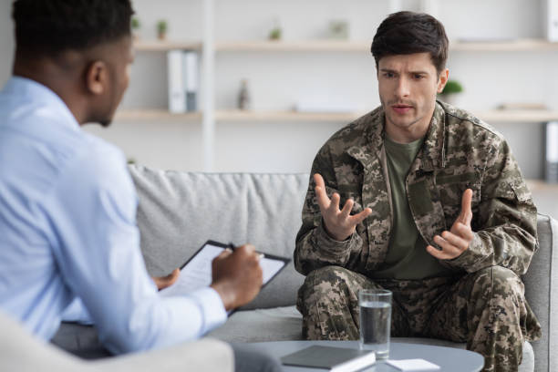 istock Emotional military man sharing his thoughts with psychotherapist 1467141113