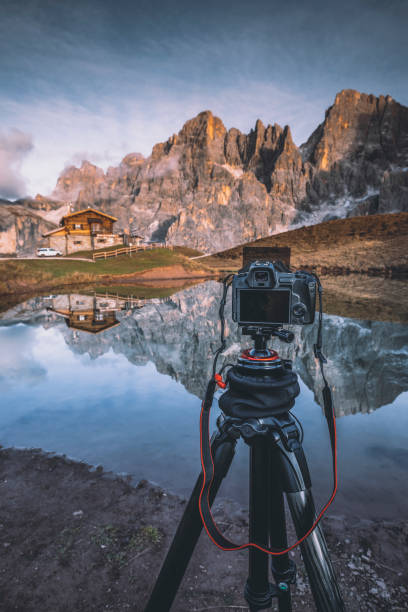 istock Camera on tripod at work and capture stunning landscape view 1467144461