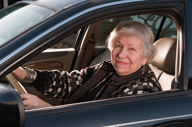istock woman, 86 years old, driving her automobile 146714501