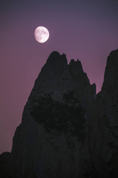 istock Moon over hills in Dolomites, Italy 1467146637