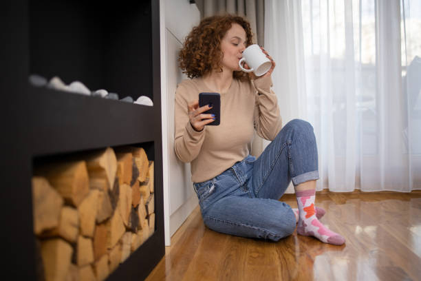 istock Happy young woman using phone 1467148490