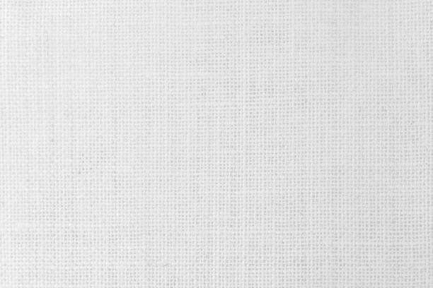 istock Jute hessian sackcloth canvas woven texture pattern background in light white color blank empty. Fabric curtain pattern gauze. Natural linen and cotton cloth mesh as clean for decoration design. 1467149741