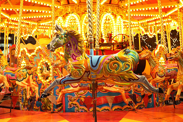 istock Multicolored horse on lit up carousel 146715362