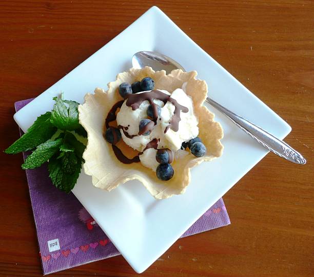 istock Waffle Dish with Ice Cream, Blueberries & Choc Topping. 146715588