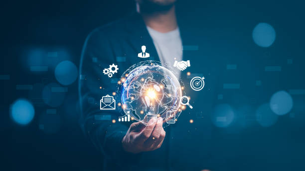 istock businessman holding light blub with virtual Global Internet connection. global internet connection application technology and digital marketing, Financial and banking, Digital link tech, big data. 1467157002
