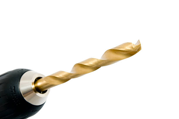 istock Titanium hss metal drill bit in keyless chuck 146715791