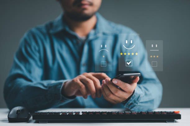 istock User give rating to service experience on online application, Customer review satisfaction feedback survey concept, Customer can evaluate quality of service leading to reputation ranking of business. 1467162288
