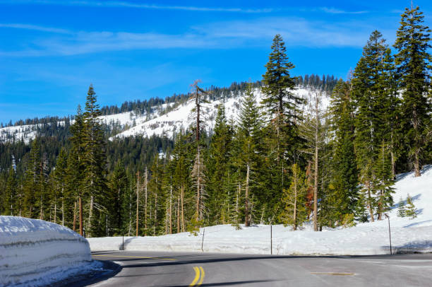 istock Rural Road Through Snow Covered Mountain Pass 1467166372