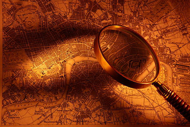 istock Old map of London with magnifying glass 146717273