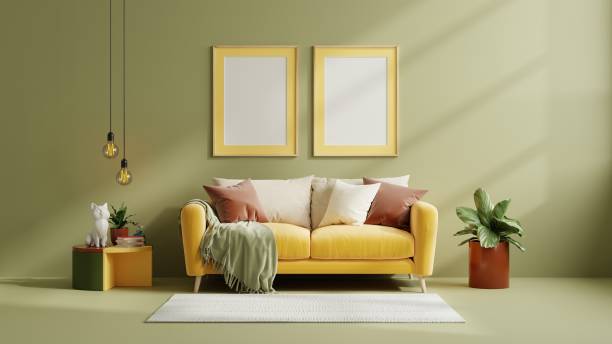 istock Mockup two poster frame with yellow sofa on empty dark green color wall background. 1467174623