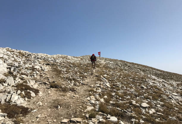 Uludag, Bursa, Turkey - September 20: Mountaineer climbing at Mount Uludag Great Summit on September 20, 2017 in Bursa, Turkey. Uludag is the highest mountain in Marmara Region.