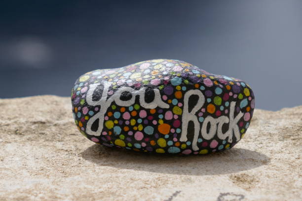 istock You rock painted on kindness rock close-up on stone surface 1467180898