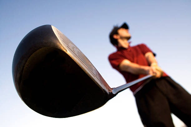 Grass perspective of golfer and club stock photo