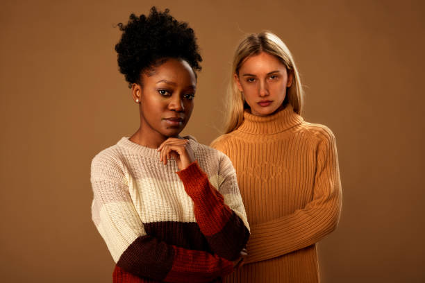 istock Portrait of multicultural girls posing in studio while looking at the camera. 1467188672