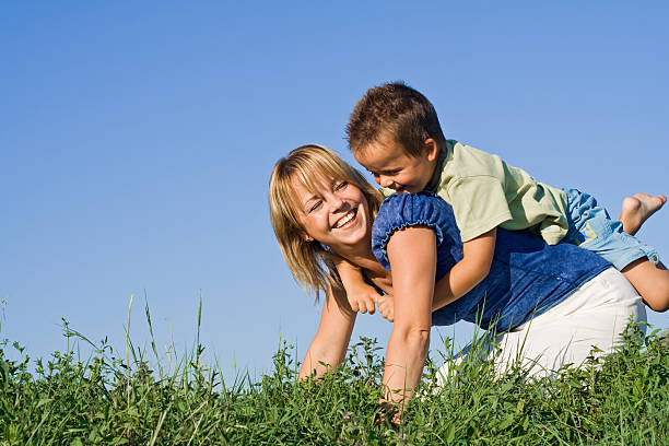 istock Mother and son playing outdoors 146719003