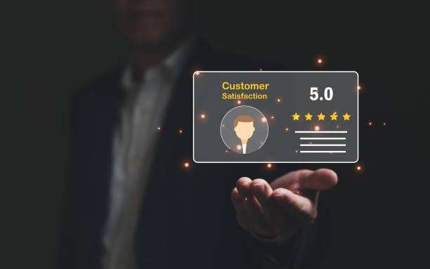 istock Selective focus at finger of business man while point finger to choose feedback on excellent customer service with five star score with smile. Service evaluation concept with futuristic icon 1467203793