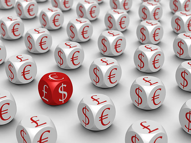 Row of cubes with currency symbols stock photo