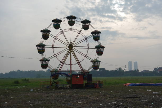 istock the ferris wheel left behind by the carnival 1467213398