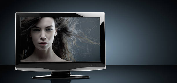 istock A sleek LCD television set with a woman on the screen 146721573