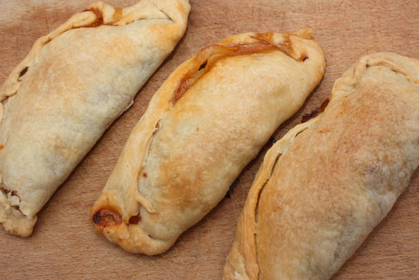 istock Homemade empanadas on a wooden kitchen worktop 1467216034