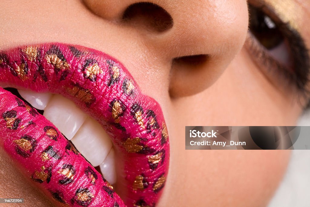 Pink Leopard Lips Closeup Beauty Shot of Creative Lipstick with Pink Leopard Pattern Adult Stock Photo