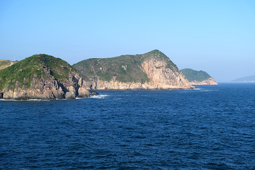 View of the rocky cliffs at Clear Water Bay Peninsula in the New Territories of Hong Kong.