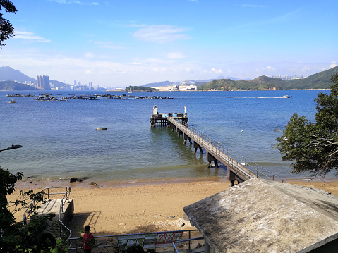 Public pier in Tung Lung Chau, an island located off the tip of the Clear Water Bay Peninsula in the New Territories of Hong Kong.