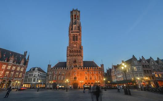 Bruges, Belgium - Oct 6, 2018. Night scene of Belfry Tower (Belfort) of Bruges. It is medieval bell tower in the historical centre of Bruges, Belgium.