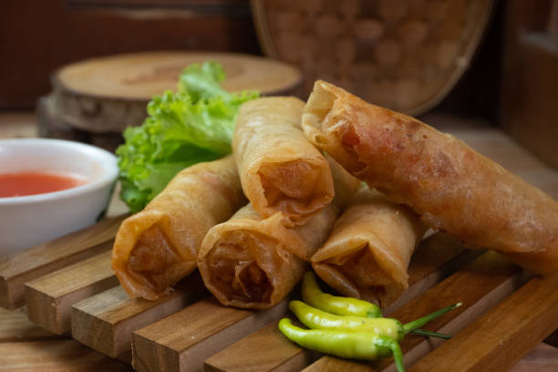 istock lumpia or lunpia is a typical snack from Java in Indonesia, in English it is often called spring rolls 1467229440