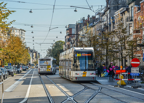 Ghent, Belgium - Oct 6, 2018. Tram on the streets of Ghent, Belgium. Ghent is a historic city, yet at the same time a contemporary one.