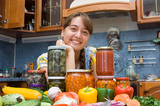Girl with vegetables Girl with a lot of types of vegetables in the kitchen pattyson stock pictures, royalty-free photos & images